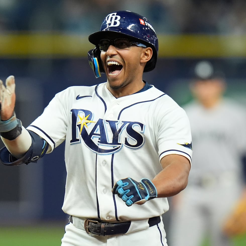Richie Palacios celebrates after hitting a two-run single against the Yankees in the American League Division Series.