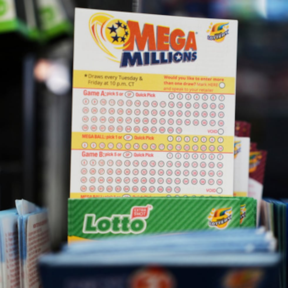 FILE - Mega Millions Lottery play slips are displayed for customers at a convenience store in Chicago, Sunday, April 6, 2025. (AP Photo/Nam Y. Huh, file)