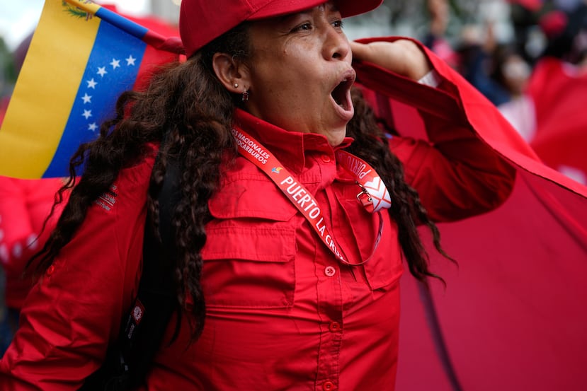 Workers of Venezuela's state-owned PDVSA oil company rally to back an oil reform bill proposed by acting President Delcy Rodriguez to loosen state control and open the industry to private and foreign investment in Caracas, Venezuela, Thursday, Jan. 29, 2026. (AP Photo/Ariana Cubillos)