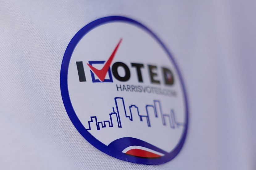 A man wears an "I voted" sticker outside a polling location Tuesday, March 3, 2026, in Spring, Texas. (AP Photo/David J. Phillip)