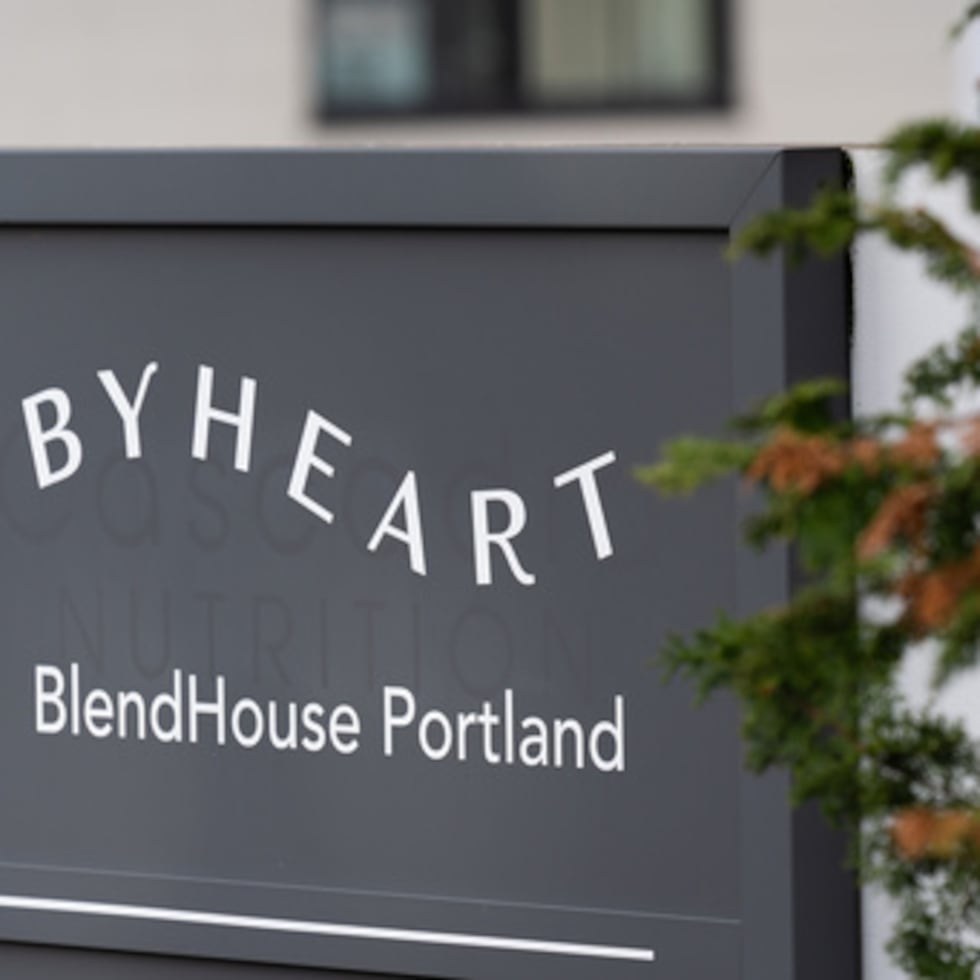 A sign for ByHeart, a manufacturer of organic baby formula, is displayed outside a building that houses a plant for the company on Tuesday, Nov. 11, 2025, in Portland, Ore. (AP Photo/Jenny Kane)