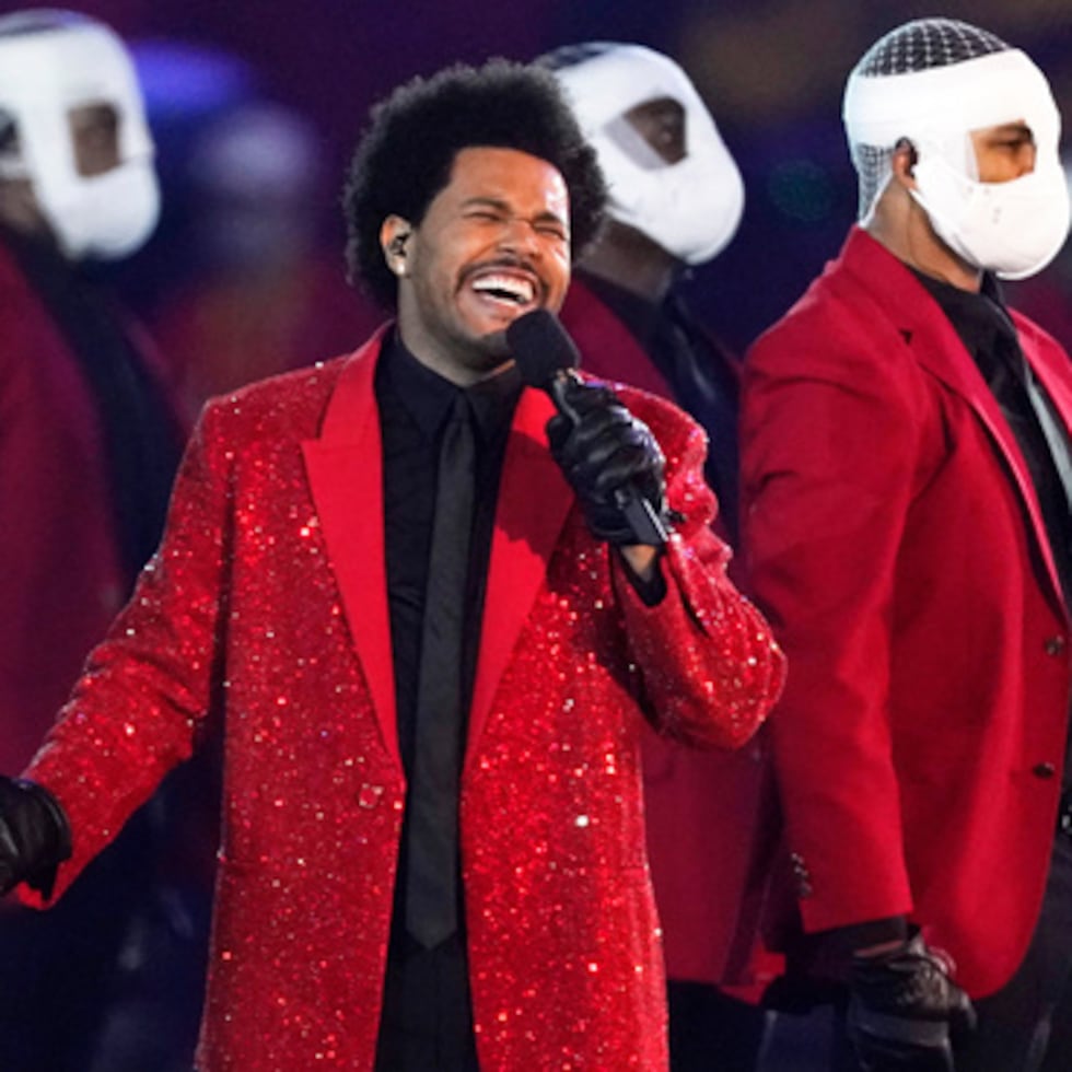 FILE - The Weeknd performs during the halftime show of the NFL Super Bowl 55 football game between the Kansas City Chiefs and Tampa Bay Buccaneers, on Feb. 7, 2021, in Tampa, Fla. (AP Photo/Ashley Landis, File)