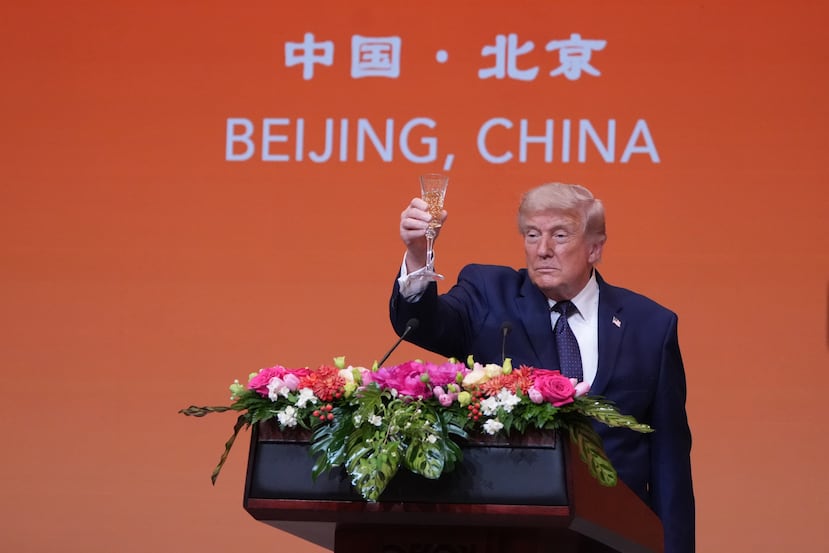 President Donald Trump proposes a toast during a state dinner with China's President Xi Jinping at the Great Hall of the People on Thursday May 14, 2026, in Beijing. (AP Photo/Mark Schiefelbein)