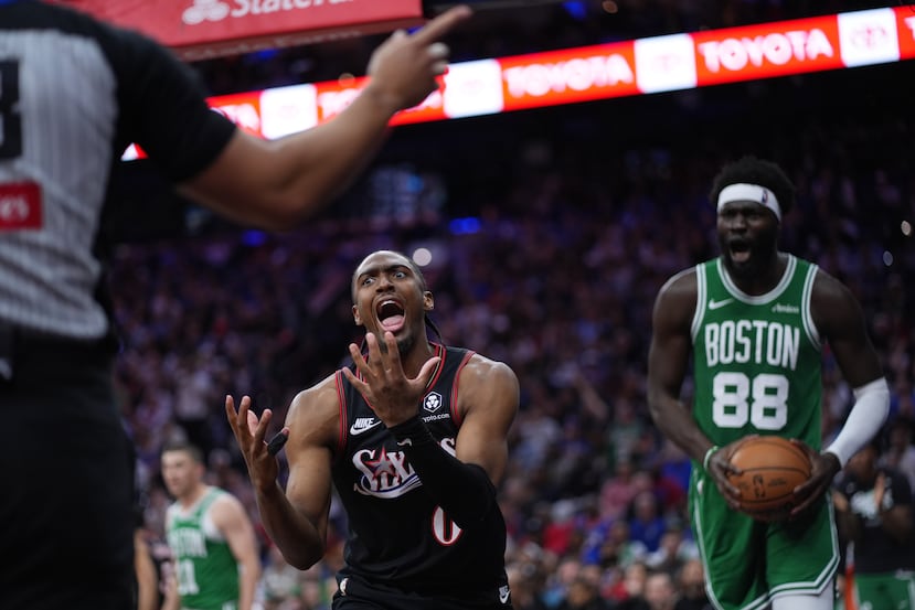 Philadelphia 76ers' Tyrese Maxey, center, reacts to referee Andy Nagy during the second half of Game 3 against the Boston Celtics in a first-round NBA playoffs basketball series Friday, April 24, 2026, in Philadelphia. (AP Photo/Matt Slocum)