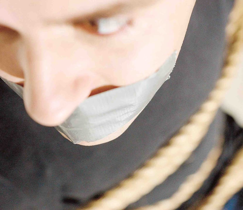 El guardia fue amordazado con una cinta adhesiva en las manos y pies. (Archivo GFR Media)