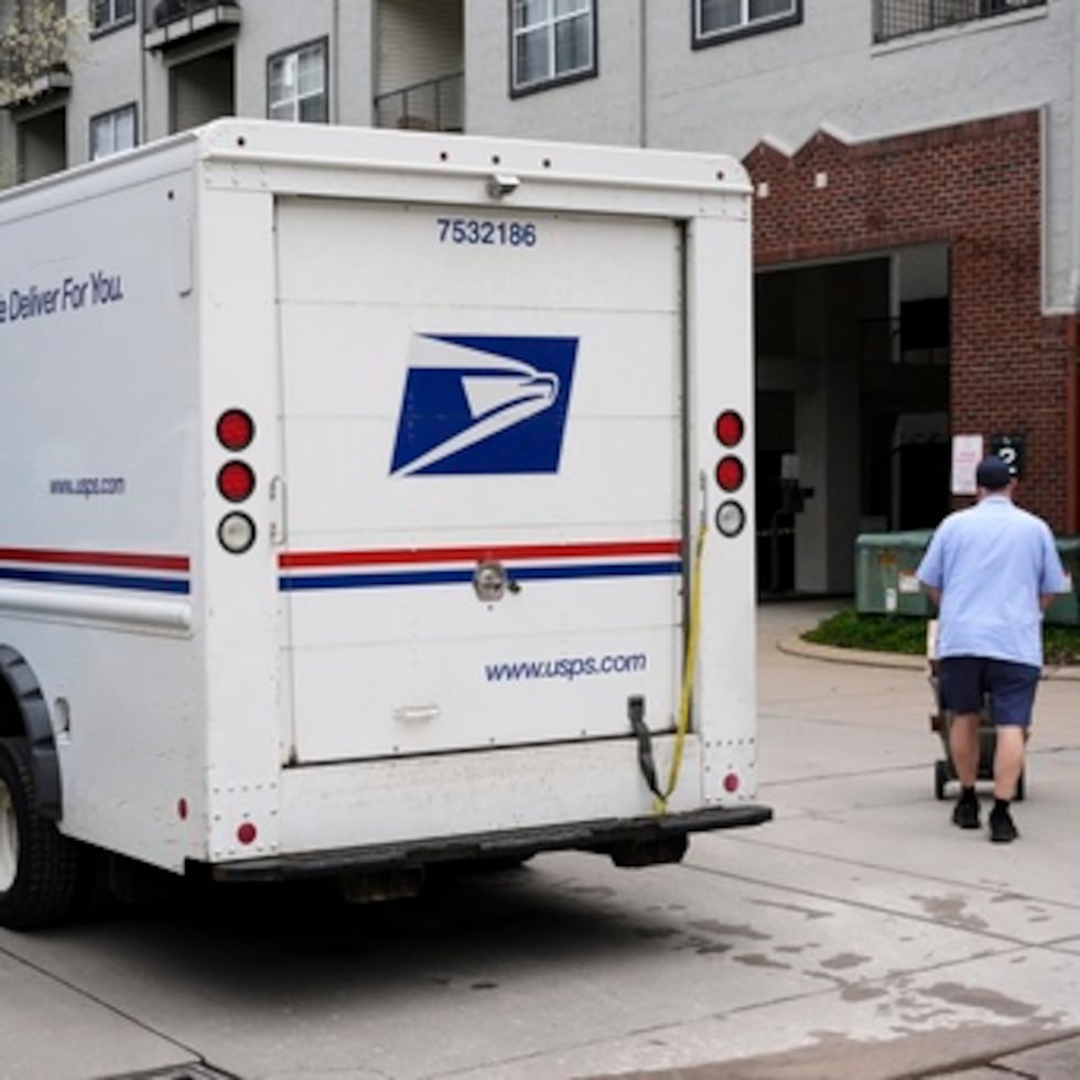 Un cartero del Servicio Postal de los Estados Unidos.