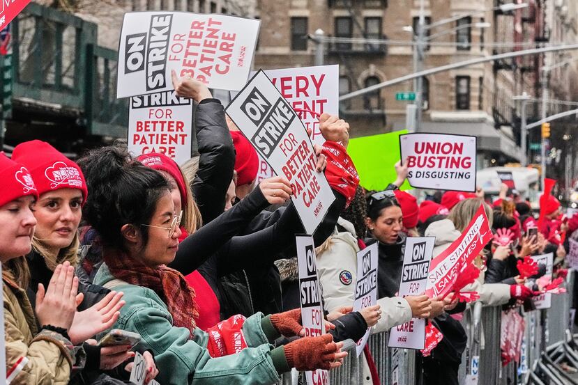 Striking nurses demonstrate outside Mt. Sinai Hospital, in New York, Wednesday, Jan. 14, 2026. (AP Photo/Richard Drew)