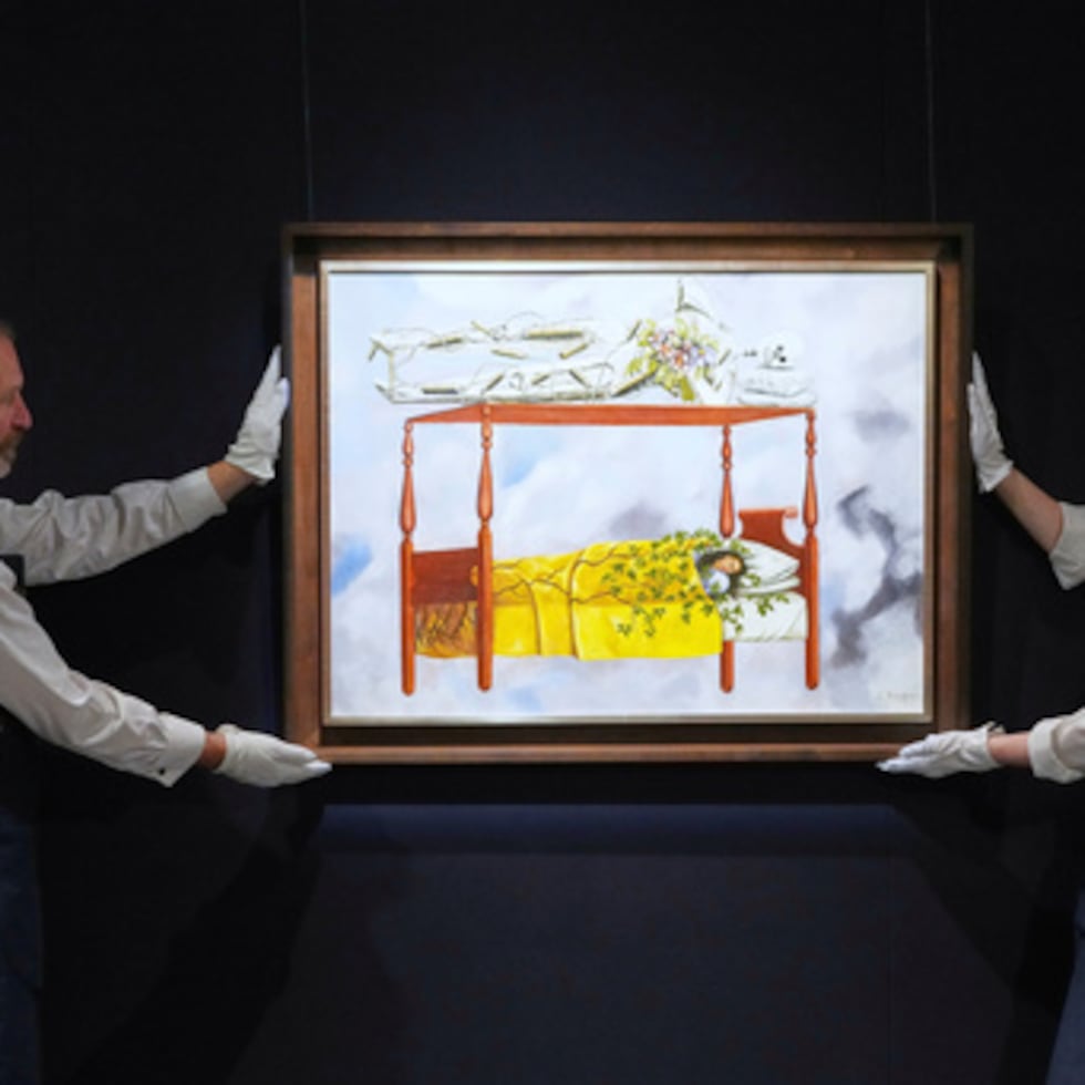 FILE - A painting by Frida Kahlo titled "El sueño (La cama)" or (The Dream (The Bed), is displayed at Sotheby's auction rooms in London, Sept. 19, 2025. The painting, estimated at 40-60 million US dollars, is part of a collection of surrealist masterpieces unveiled ahead of its upcoming sale in New York. (AP Photo/Kirsty Wigglesworth, File)