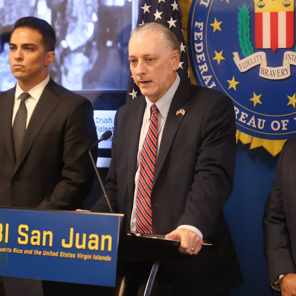 William Stephen Muldrow (center) gives details of how the 10 businessmen, merchants and even government contractors communicated with a contact who helped them secure loans and ensure that hundreds of thousands of dollars owed to the Treasury Department were wiped out.