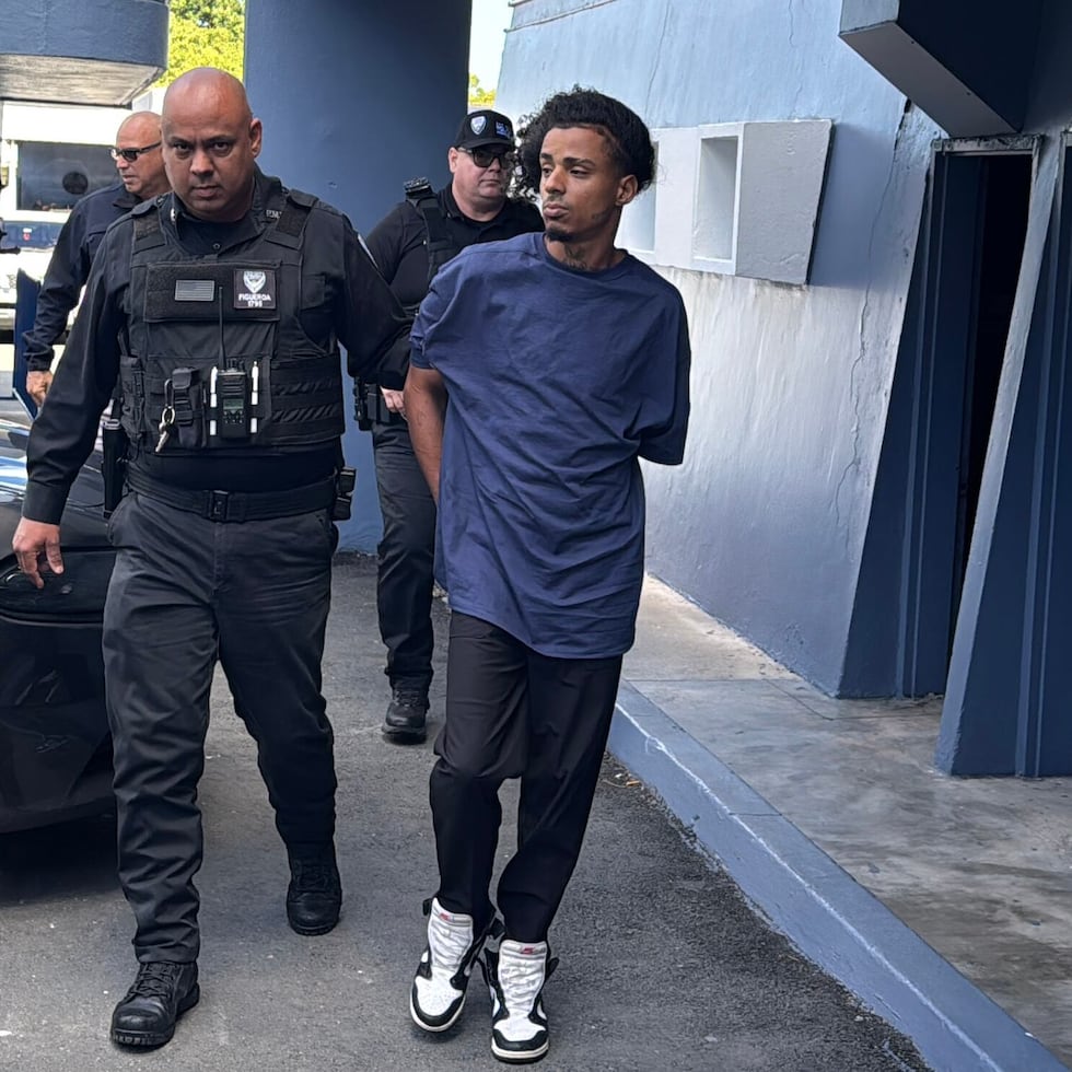 Police reported that two men remain in custody one day after the murder of a tourist in Old San Juan.