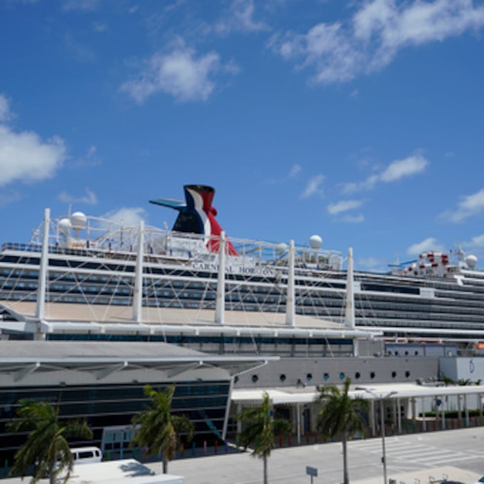 FILE - Carnival Cruise Line's Carnival Horizon cruise ship is shown docked at PortMiami, Friday, April 9, 2021, in Miami. (AP Photo/Wilfredo Lee,File)