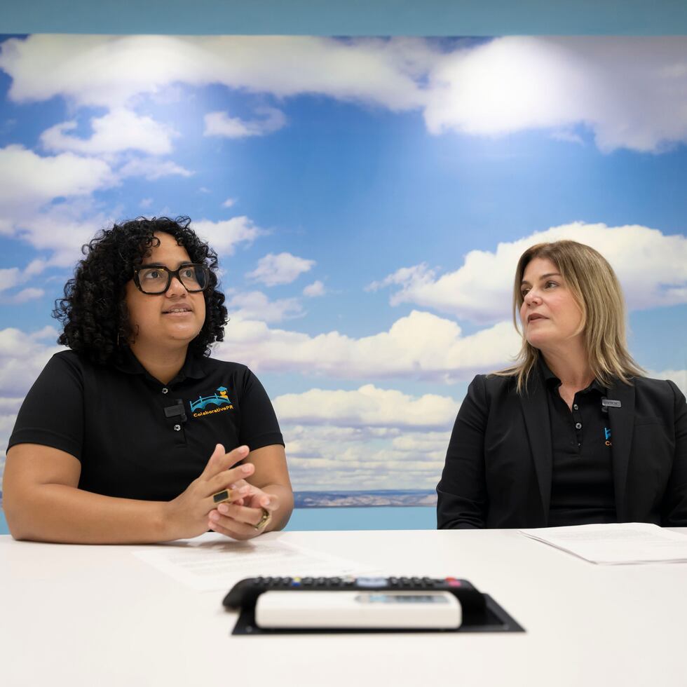 Ana Serrano Ocasio, Operations and Finance Manager of ColaborativoPR, left, and Leonor GarcÃa Guerra, Executive Director, detail the achievements of the nonprofit organization in its first 10 years of operation.