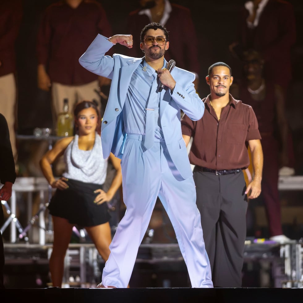The blue suit Benito wore to open his concerts was custom-made by Anthony Vaccarello for Saint Laurent.
