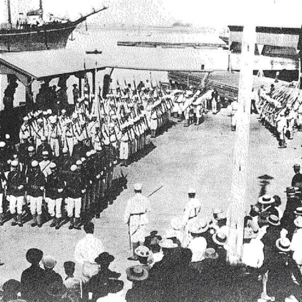 Marines from the U.S.S. Philadelphia landed in Honolulu Harbor to participate in Annexation Day ceremonies in 1898. Scanned image from modern Hawaiian history compiled by Ann Rayson, photo attribution to the Hawaii State Archives.