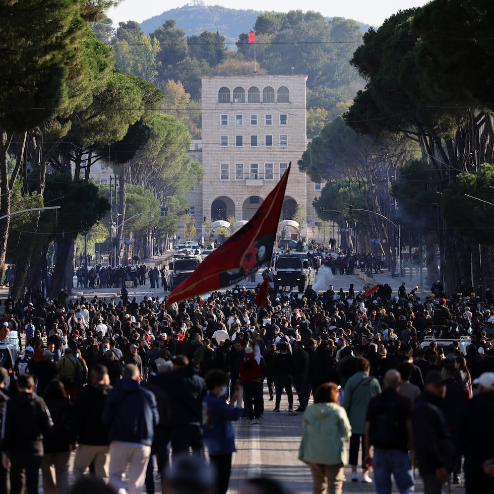 Protesters gather during clashes at an anti-government demonstration in Tirana, Albania, Sunday, Oct. 18, 2026. (AP Photo/Hameraldi Agolli)