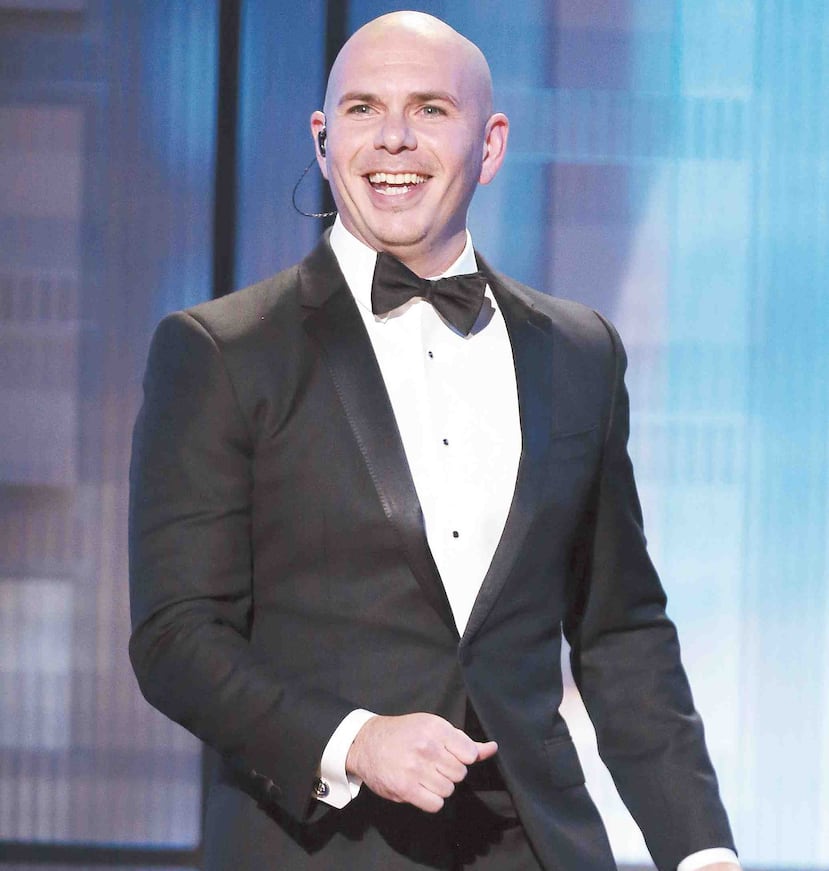 La madre de Pitbull -cuyo verdadero nombre es Armando Christian Pérez- abandonó la isla caribeña poco después de la revolución cubana para refugiarse en Miami, donde nació el cantante. (Archivo / AP)