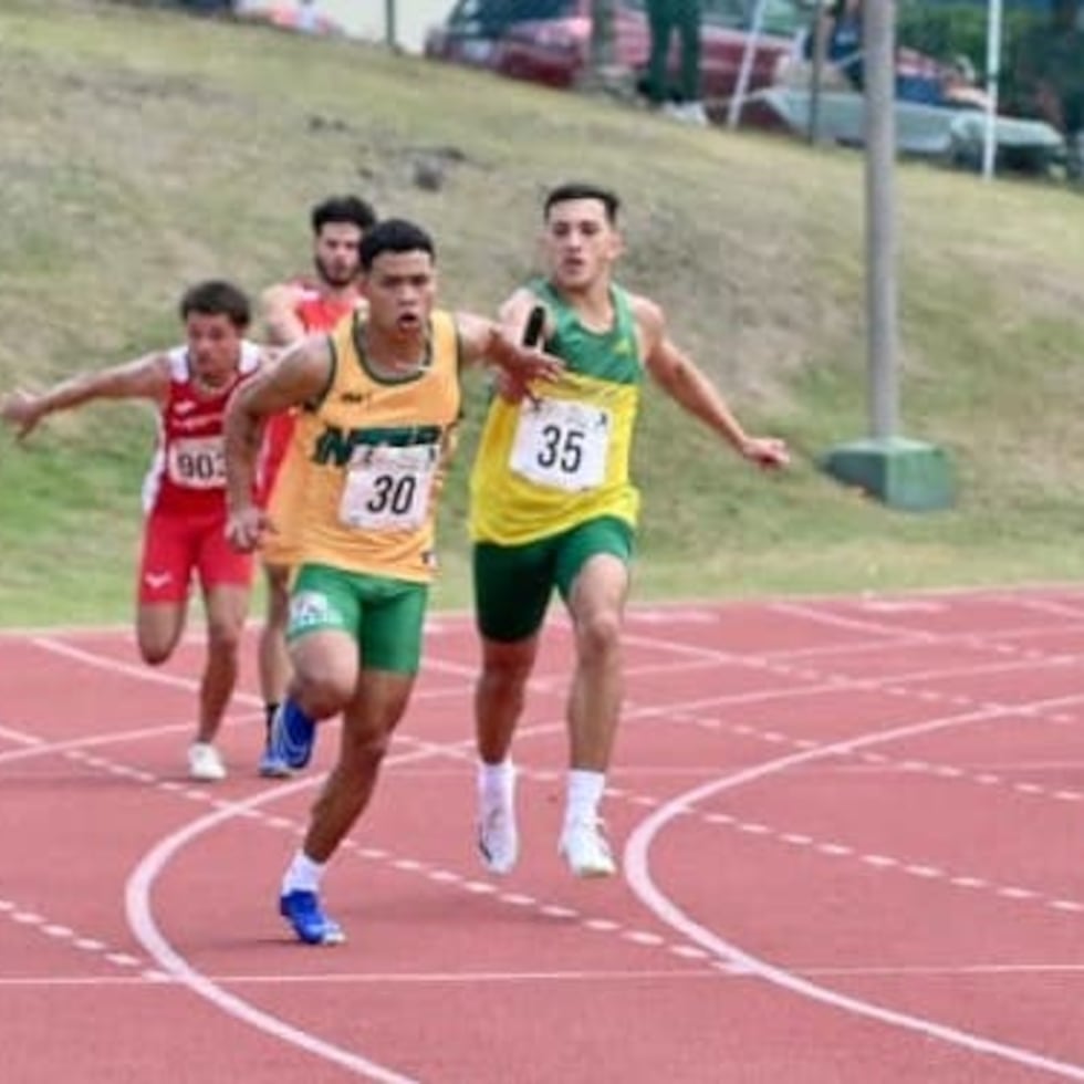 Geral González Velázquez, here receiving the baton during an Intercollegiate Athletic League race last February, was a passenger in the crashed car.
