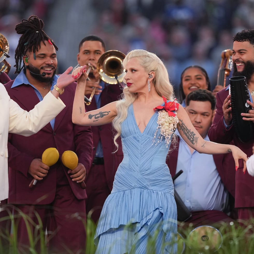 Bad Bunny and Lady Gaga perform during halftime of the NFL Super Bowl 60 football game between the New England Patriots and the Seattle Seahawks, Sunday, Feb. 8, 2026, in Santa Clara, Calif. (AP Photo/Matt Slocum)