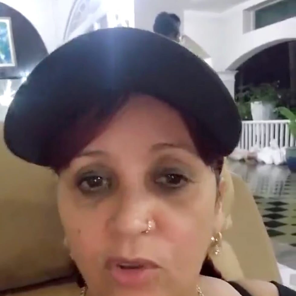 Puerto Rican woman in Jamaica in the wake of Hurricane Melissa.