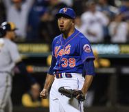 New York Mets relief pitcher Edwin Diaz celebrates the team's 5-4 win over the Milwaukee Brewers in a baseball game Thursday, June 16, 2022.
