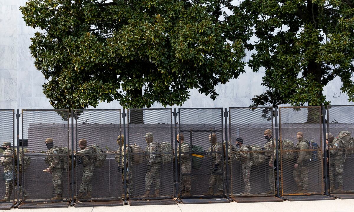 Returns 12 soldiers from the group who will be protecting Joe Biden from his extremist right-wing militias