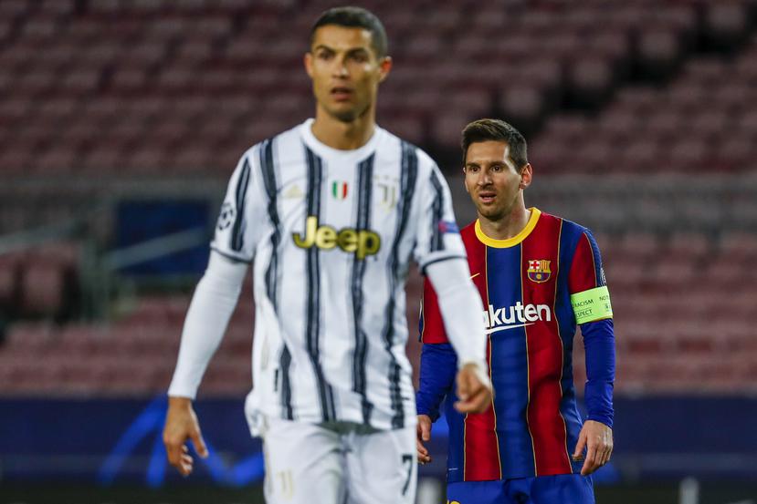 En esta foto de diciembre de 2020, Lionel Messi, del Barcelona, y Cristiano Ronaldo, de Juventus, durante un partido de la Liga de Campeones. Según el presidente de la UEFA, Aleksander Ceferin, estos jugadores no podrían competir en la Eurocopa de este año y la Copa del Mundo del año entrante.