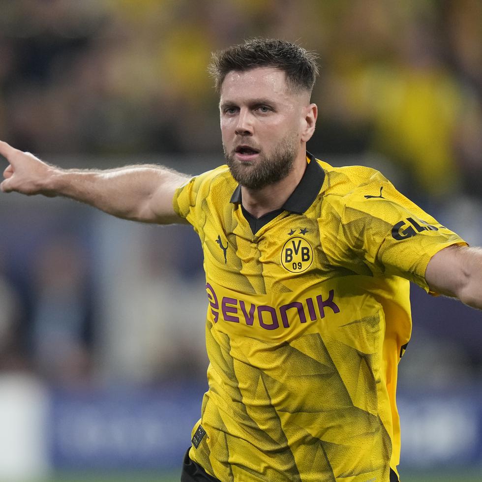 Niclas Füllkrug celebra tras anotar el gol que le dio a Borussia Dortmund la victoria.