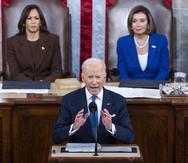 President Joe Biden delivers his first State of the Union address to a joint session of Congress at the Capitol, Tuesday, March 1, 2022, in Washington as Vice President Kamala Harris and House speaker Nancy Pelosi of Calif., look on. (Jim Lo Scalzo/Pool via AP)