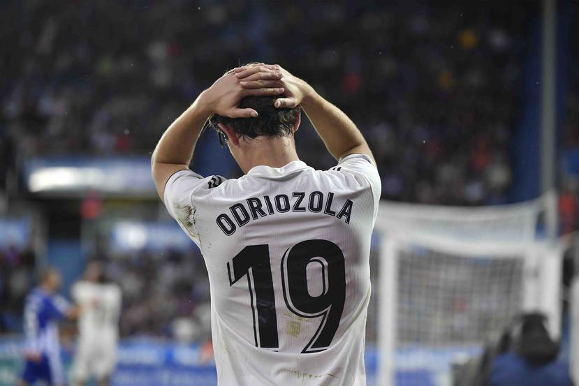 Alvaro Odriozola, del Real Madrid, reacciona durante el juego. (AP)
