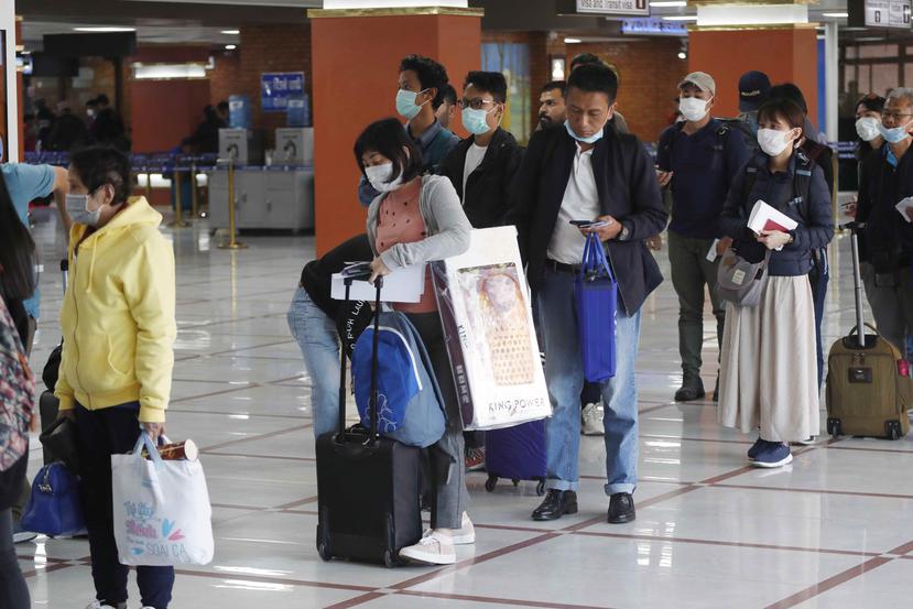 El brote del virus ha provocado cancelaciones en vuelos y hoteles que representan uno de los mayores movimientos económicos en Asia. (AP)
