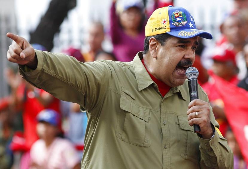 Maduro aseguró que desde los EE.UU. se presiona a la delegación opositora en los diálogos para que rechace el "acuerdo de paz". (AP)