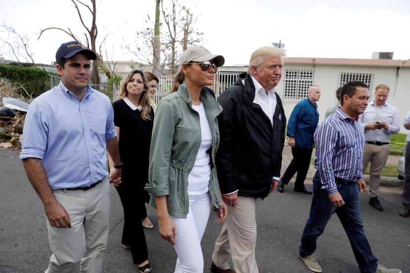 El 3 de octubre del pasado año, el presidente de EE.UU., Donald Trump, visitó por pocas horas la isla para observar los daños que dejó a su paso el huracán. (AP / Evan Vucci)
