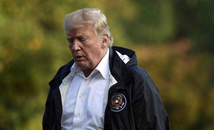 Donald Trump a su llegada a la Casa Blanca tras su viaje a Carolina del Norte y Sur para ver los daños del huracán Florence. (AP)