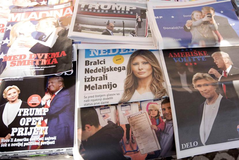 Varios periódicos llevan a sus portadas al presidente electo estadounidense Donald Trump y a su esposa Melania en Liubliana. (EFE)