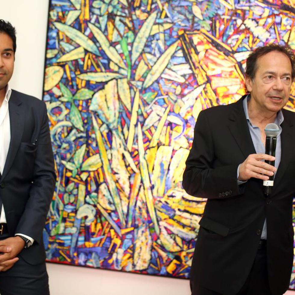 Fahad Ghaffar y su exsocio John Paulson, durante una presentación de la expansión millonaria en uno de los hoteles de la empresa.