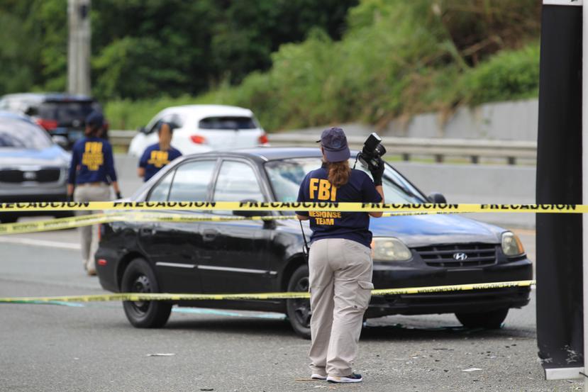 Escena relacionada al asesinato de un joven en Guaynabo.